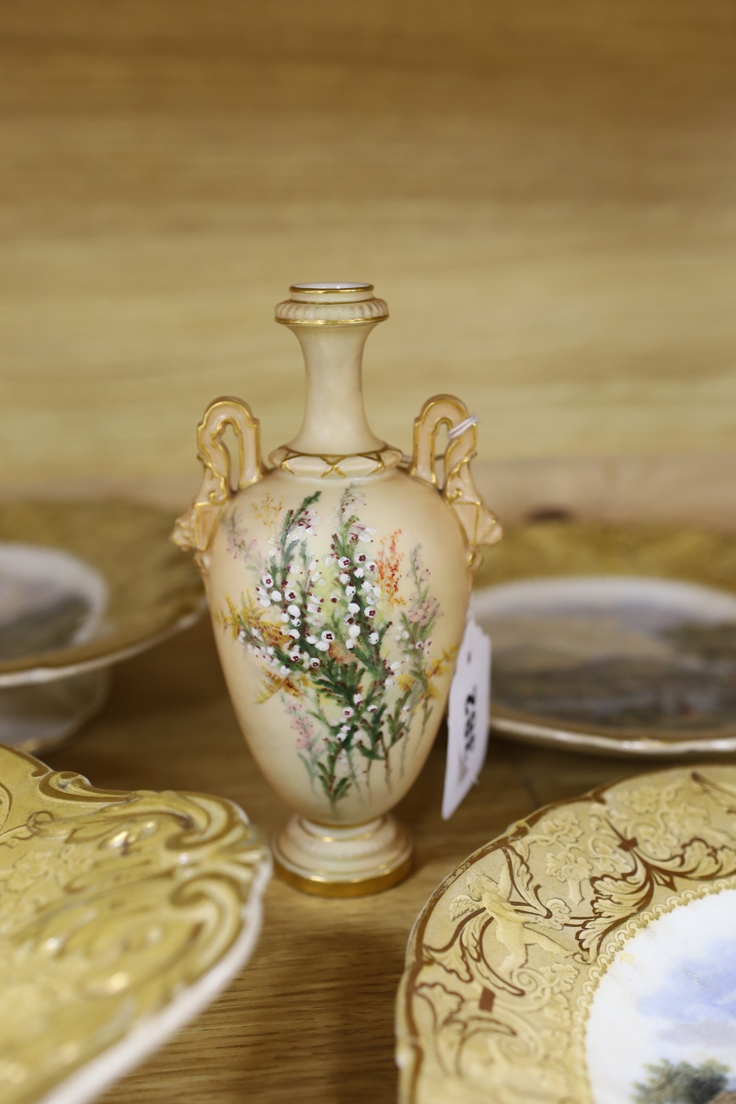 A Worcester blush ivory miniature vase, 16cm, and an F & R Pratt multicoloured four piece dessert set